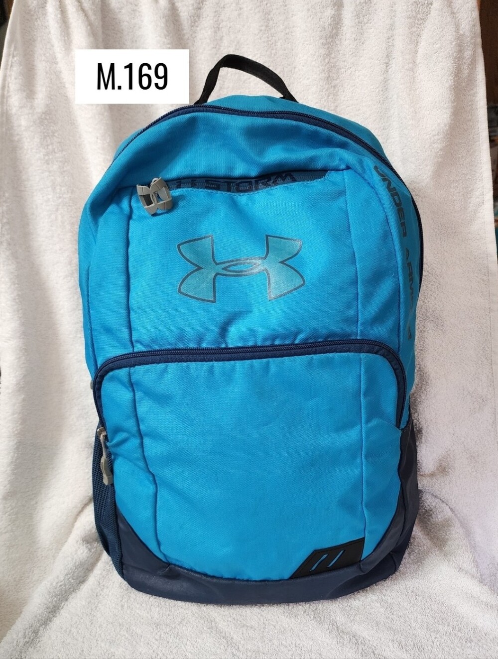 M.169- Under Armour Storm Backpack, blue teal, USED